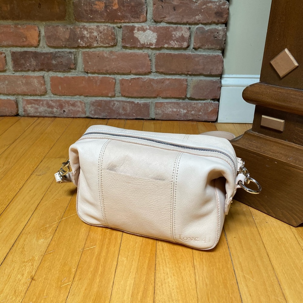 Love 41 crossbody/convertible Dopp bag.